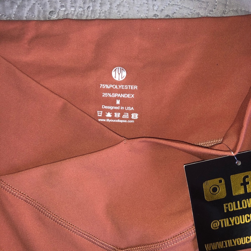 NWT TYC Terracotta Vortex Leggings